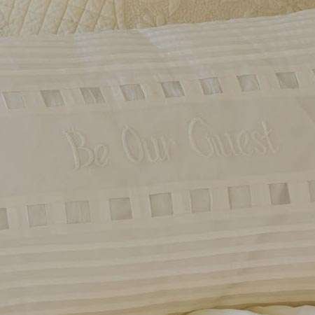 Be Our Guest – White Ruffled Cotton Bolster Pillow - Image 3